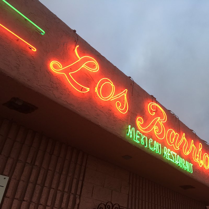 Los Barrios Exterior Sign on Building.jpg