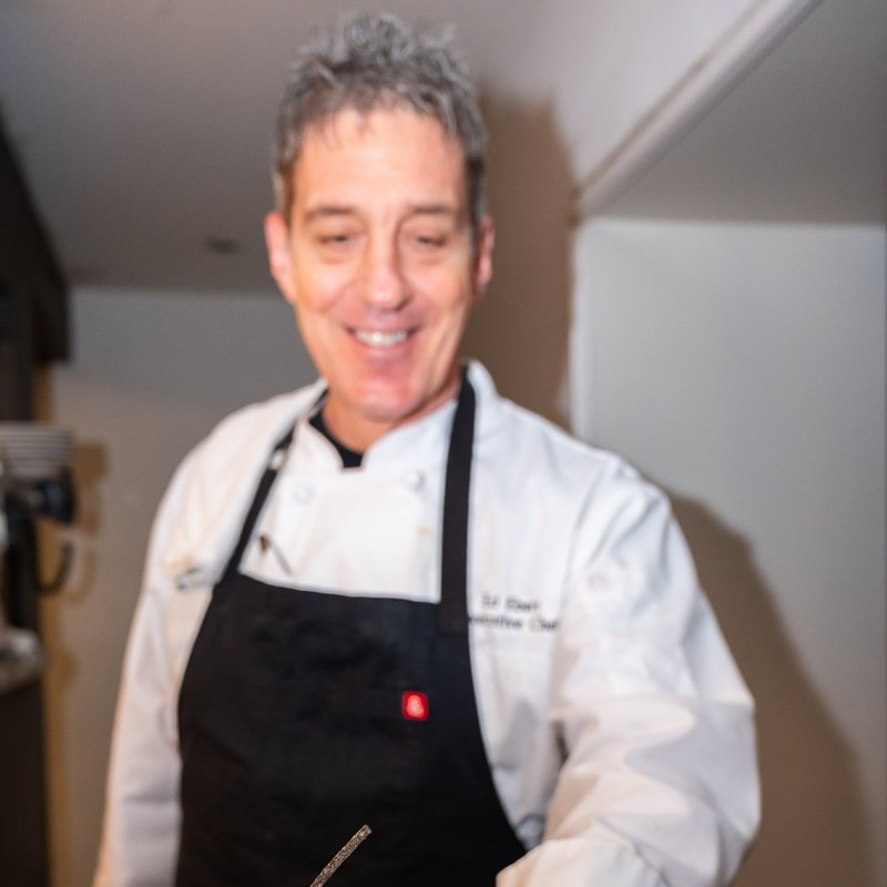 Chef Ed with a dish from Maverick Texas Brasserie.jpg