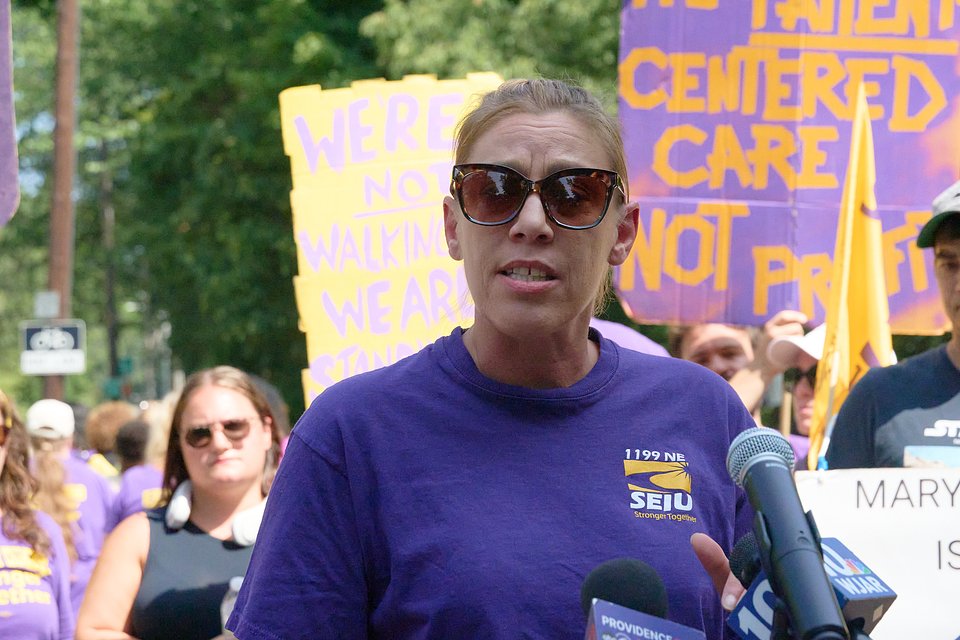 Dawn Williams speaks to the press at the Butler Hospital strike line.