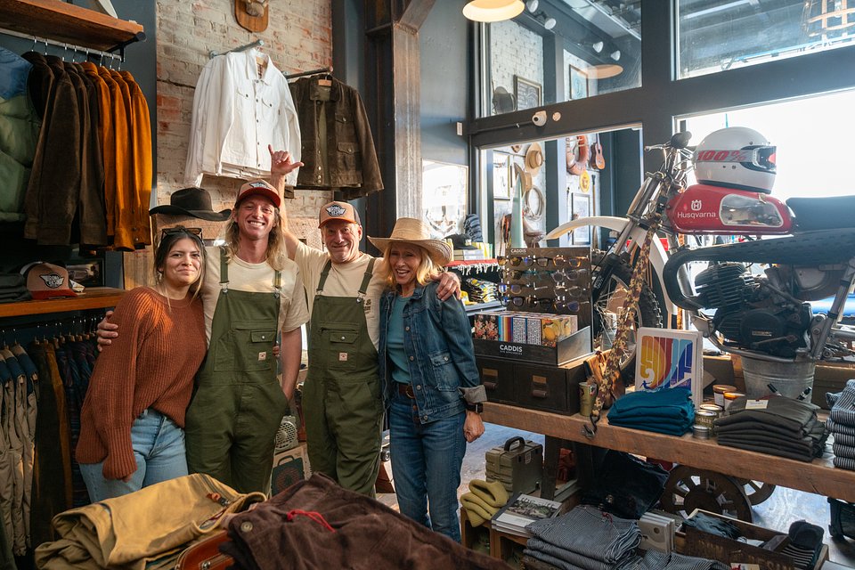 Group photo of the cast made up of locals from Ventura County after shooting scene in a local store, Iron and Resin