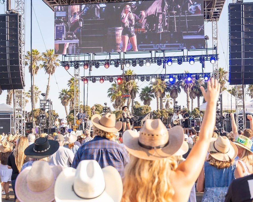 Festivalgoers gather for live country music at the Boots & Brews Country Music Festival. Photo courtesy of Boots & Brews.