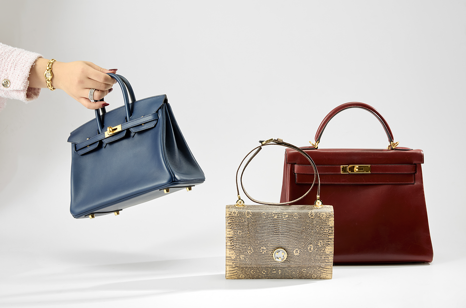 Pictured (left to right): the Birkin 25, Minuit au Faubourg, and Kelly 32.