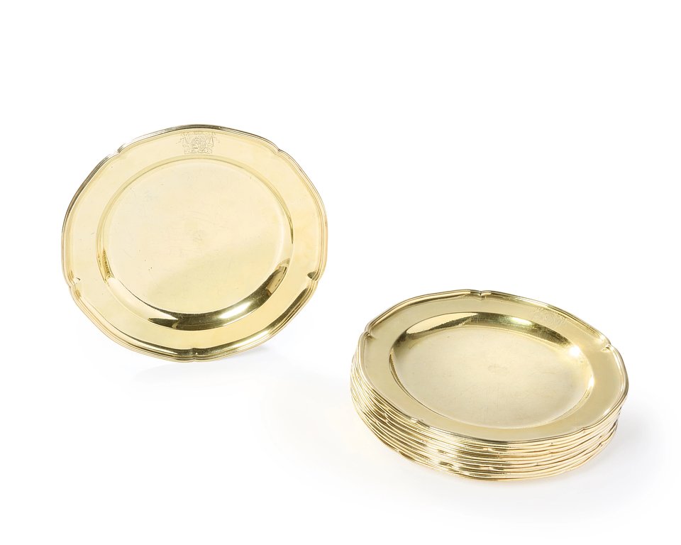 Lot 33: A set of twelve George III silver gilt plates. John Wakelin & William Taylor, London, 1787. 
Estimate: £4,000 - £6,000 