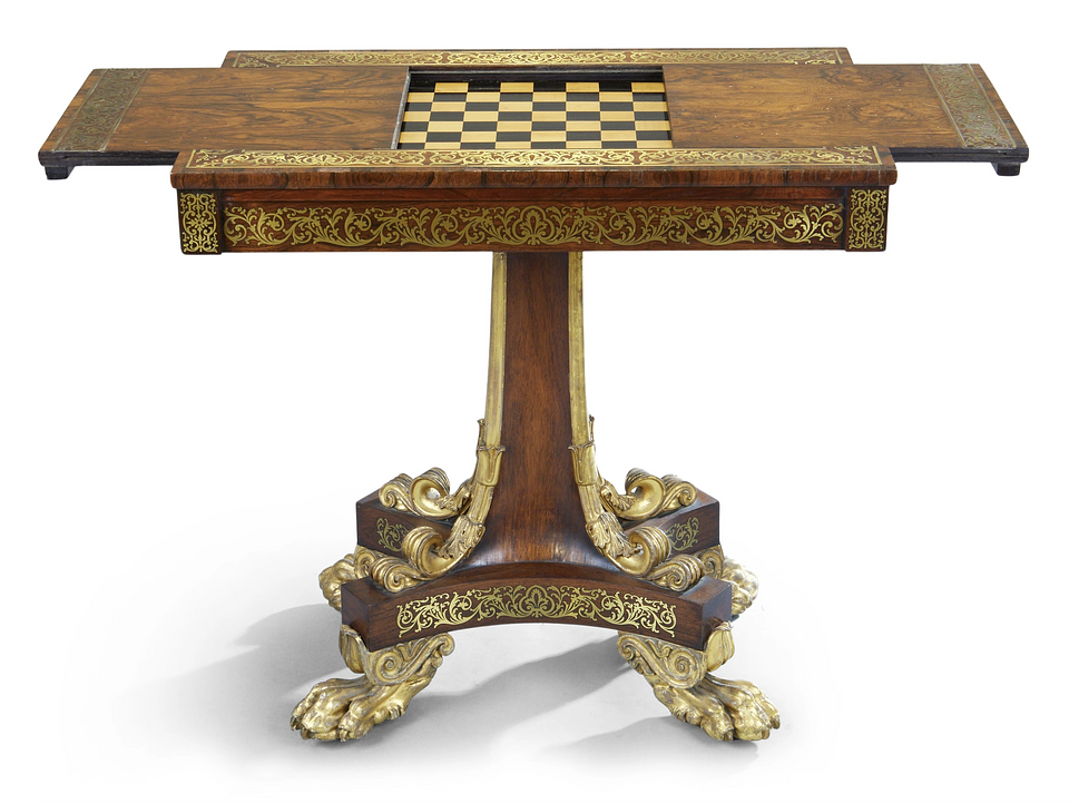Lot 271: A Regency brass marquetry, rosewood and giltwood games table, in the manner of Morel and Seddon
Price Realised: £9,840 
