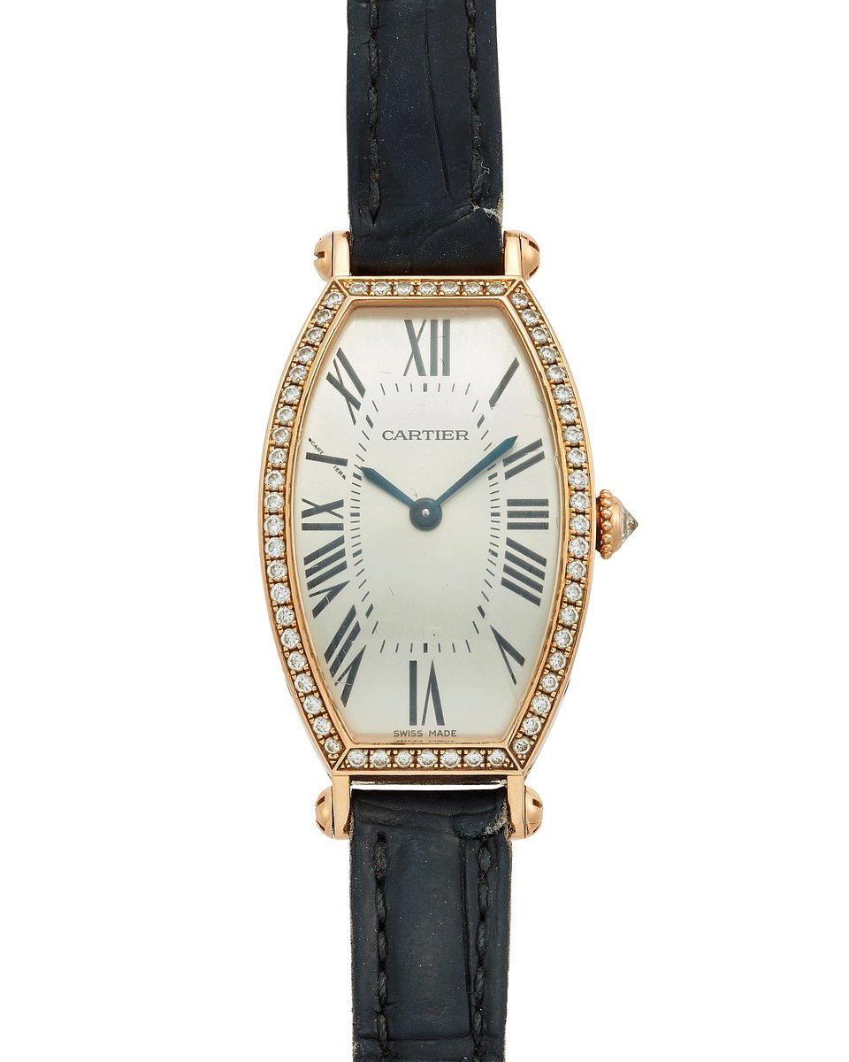 Lot 679: Cartier. An 18ct rose gold and diamond set wristwatch with box and receipt
Tonneau, Reference WE400331/2791, Serial number 279140336MX, 3rd December 2007 | Estimate: £7,000 - £9,000