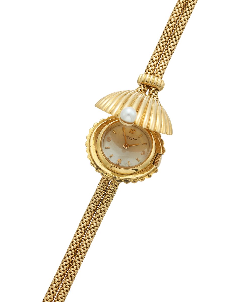 Lot 674: Vacheron Constantin. A manual wind bracelet watch in the shape of a shell with concealed dial. Circa 1960 | Estimate: £3,000 - £5,000