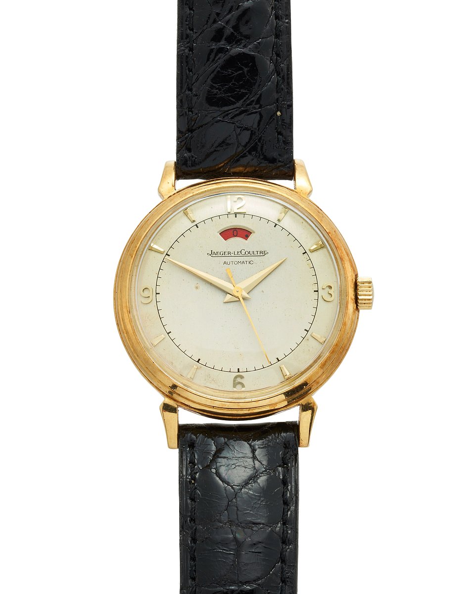 Lot 669: Jaeger-LeCoultre. An automatic calendar wristwatch with power reserve indication, circa 1950 | Estimate: £1,800 - £2,200