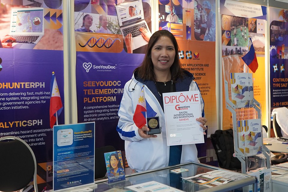 Ms. Mabelline Cahulogan poses with her Bronze Award at the 50th International Exhibition of Inventions Geneva. Photo courtesy of DOST-TAPI.