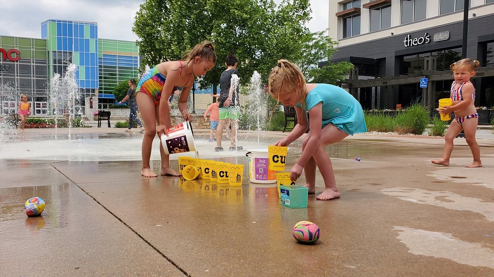 Children enjoy a summer morning at the Splash Pad, located in the heart of The Shops at Perry Crossing. | Photo courtesy of The Shops at Perry Crossing.