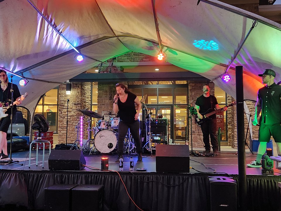 Local musicians energize the crowd during a live performance at The Shops at Highland Village’s community concert series. Photo courtesy of The Shops at Highland Village.
