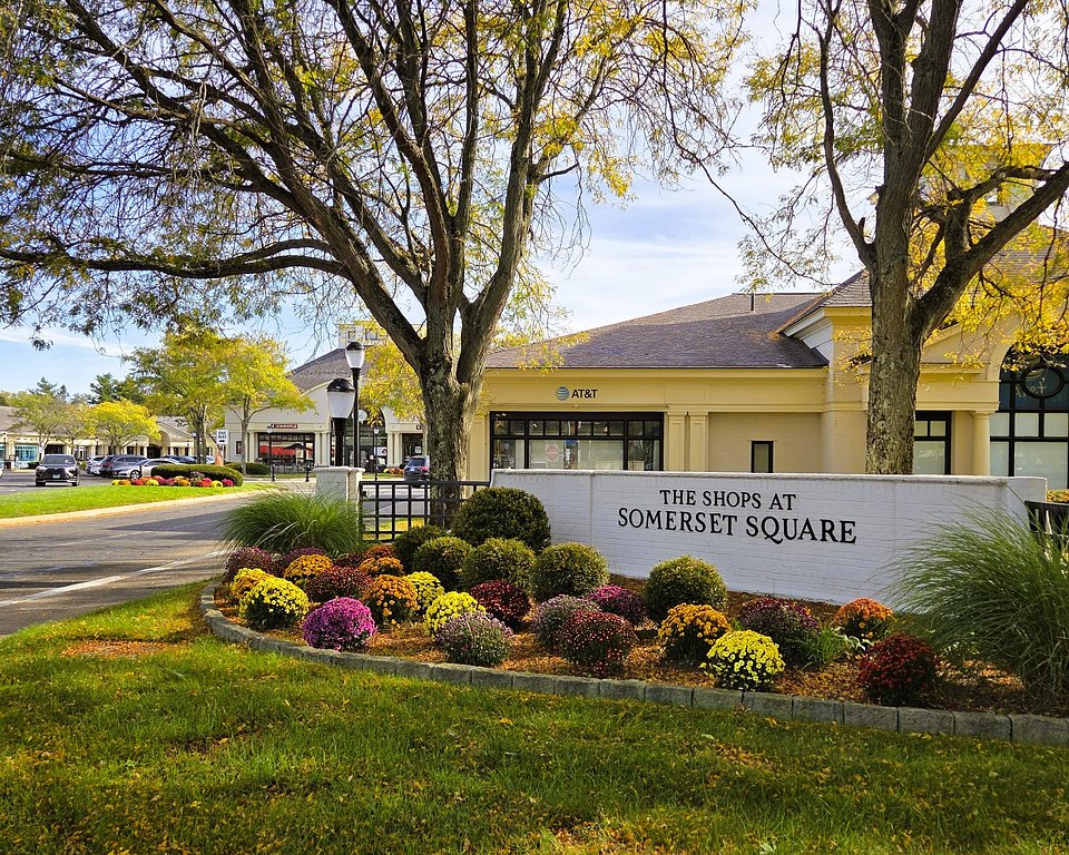 A view of The Shops at Somerset Square in Glastonbury, Connecticut — a charming open-air lifestyle center offering a curated mix of retail, dining, and local experiences in a beautifully landscaped setting.