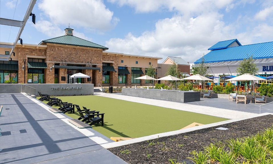 The Backyard at The Shops at Highland Village will serve as the official check-in location for Bloom and Bubbles, taking place Saturday, April 25, 2026. The outdoor space will welcome guests as they arrive to enjoy the spring-inspired event.  Photo courtesy of The Shops at Highland Village.