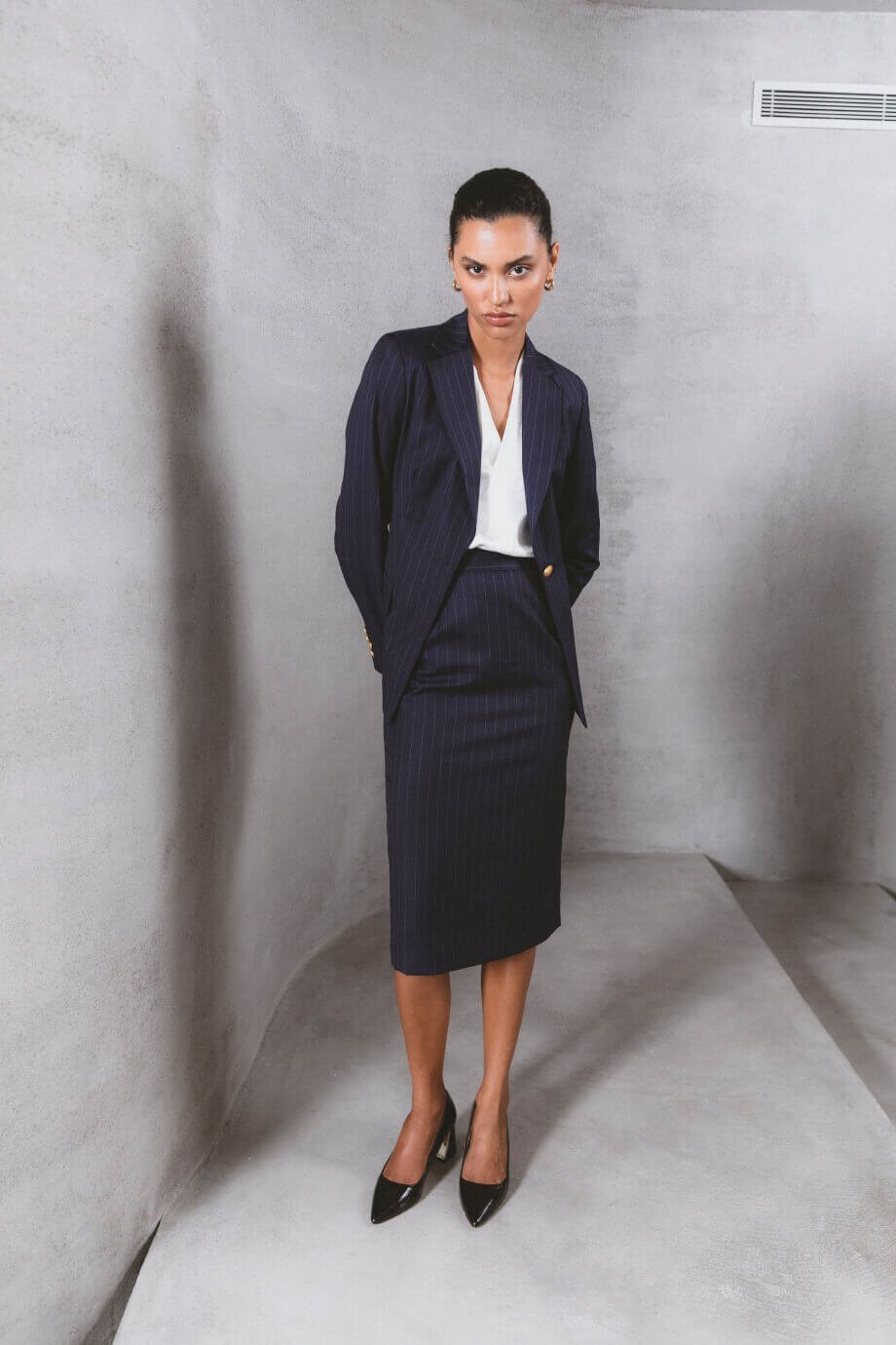 Traje falda midi a rayas PVP 404 € Sumissura