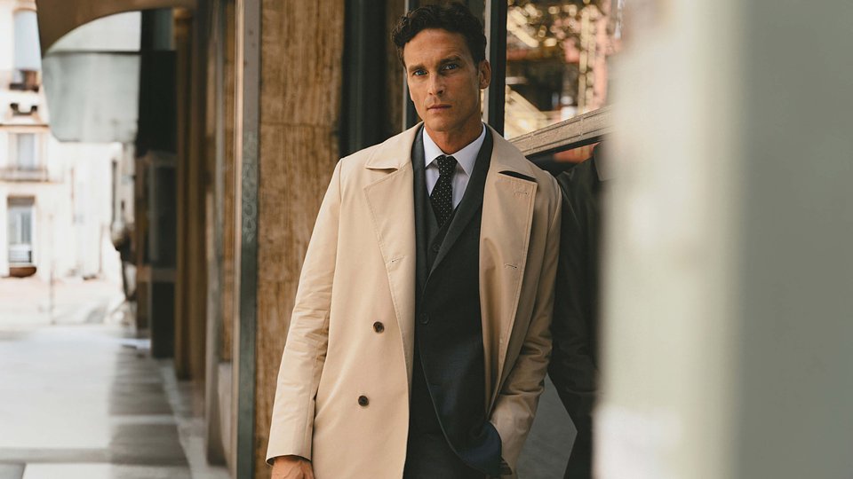 Camel-hued, double-breasted trench coat