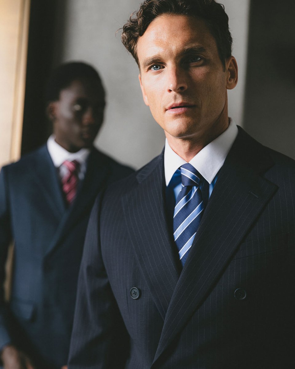 Dark blue pinstripe stretch double-breasted suit