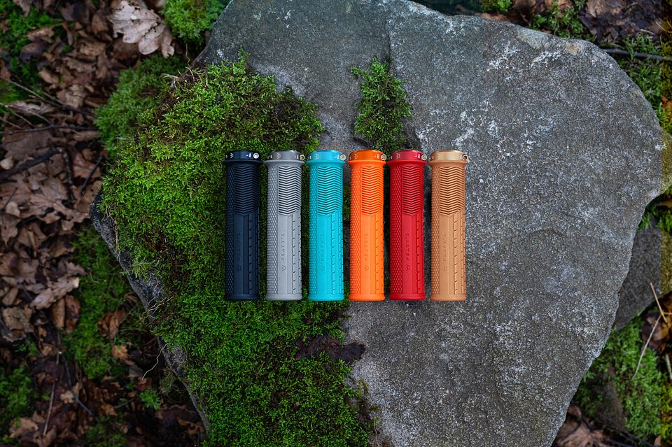 Full grip lineup on rocks and moss with coloured Lock Rings Update.jpg