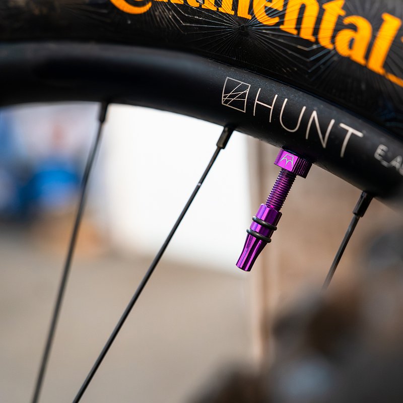 Purple- Holeshot Fast Flow Tubeless Valves On Rim.jpg