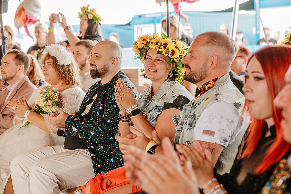 Newlyweds during the wedding ceremony at the 31st Pol'and'Rock Festival, photo by Aleksandra Kluszczyńska