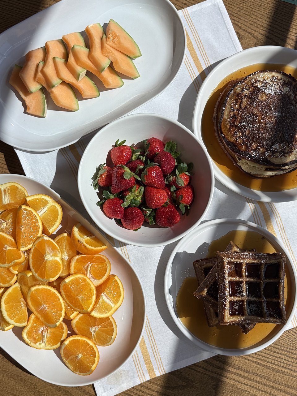 Buttermilk Pancakes and Waffles served with whipped butter and local syrup