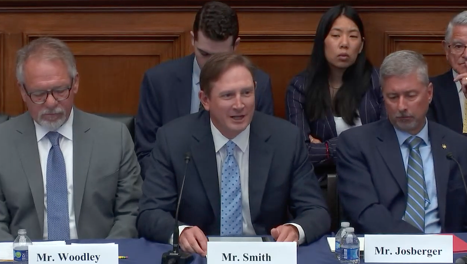Smith speaking at July 21 Roundtable