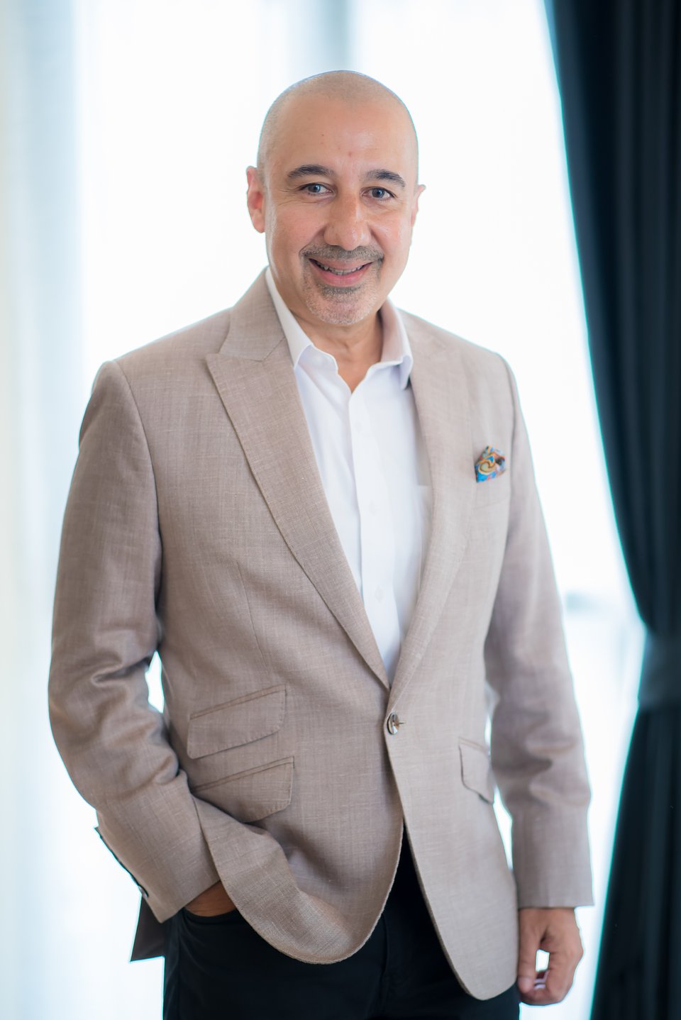 Harry Thaliwal_CEO of Cross Hotels & Resorts.jpg