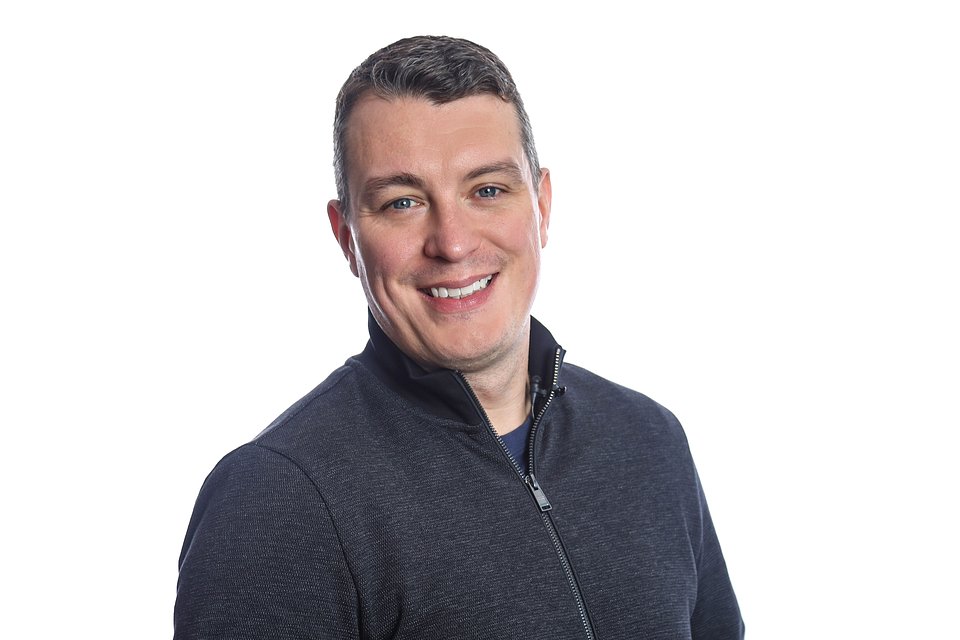 Cas Paton headshot 2.0.jpg