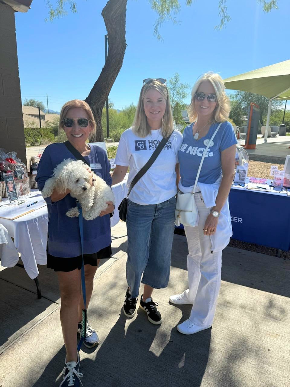 Greta Wren, Christine Sullivan and Debbie Weinrich at the Fountain Hills office’s Homes for Dogs Adoption Event.