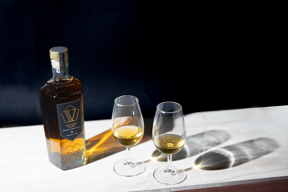 spiced-rum-pentagon-bottle-70cl-iso-tasting-neat-lifestyle-landscape.jpg