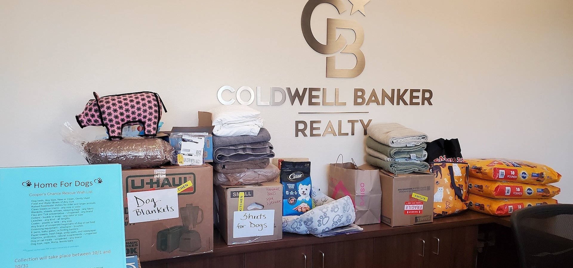 The Chandler office of Coldwell Banker Realty Hosts Successful Homes for Dogs Donation Drive