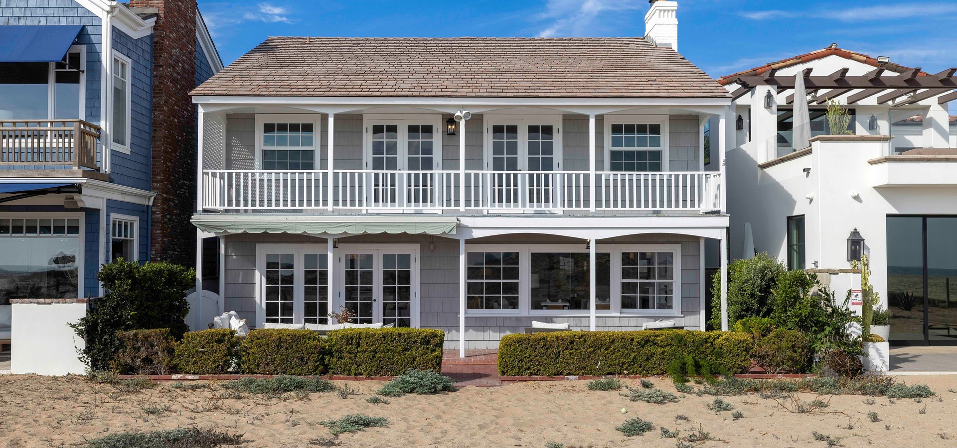Freshly Reimagined Nantucket-Style Residence on a Premier Oversized Oceanfront Lot Listed for $11,875,000 by Coldwell Banker Realty