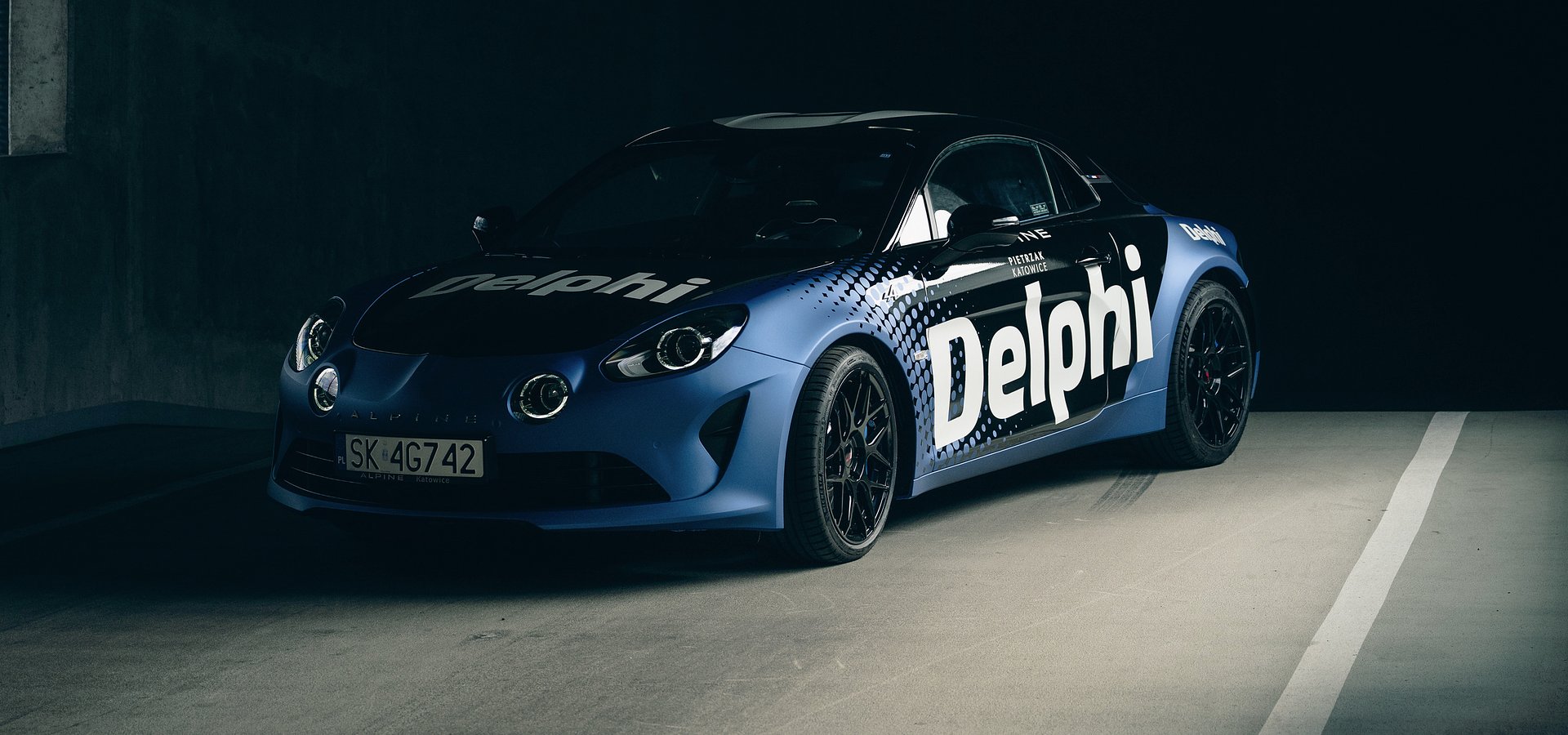 Alpine Pietrzak z Alpine A110 w barwach Delphi na ROADFLAVOR:colors/BLUE