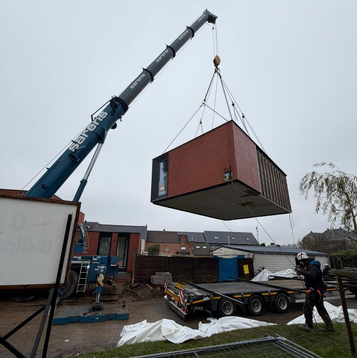 Sarens contributes to the projected 3.2% growth in Belgian construction between 2026 and 2029 through the installation of modular housing in Herzele