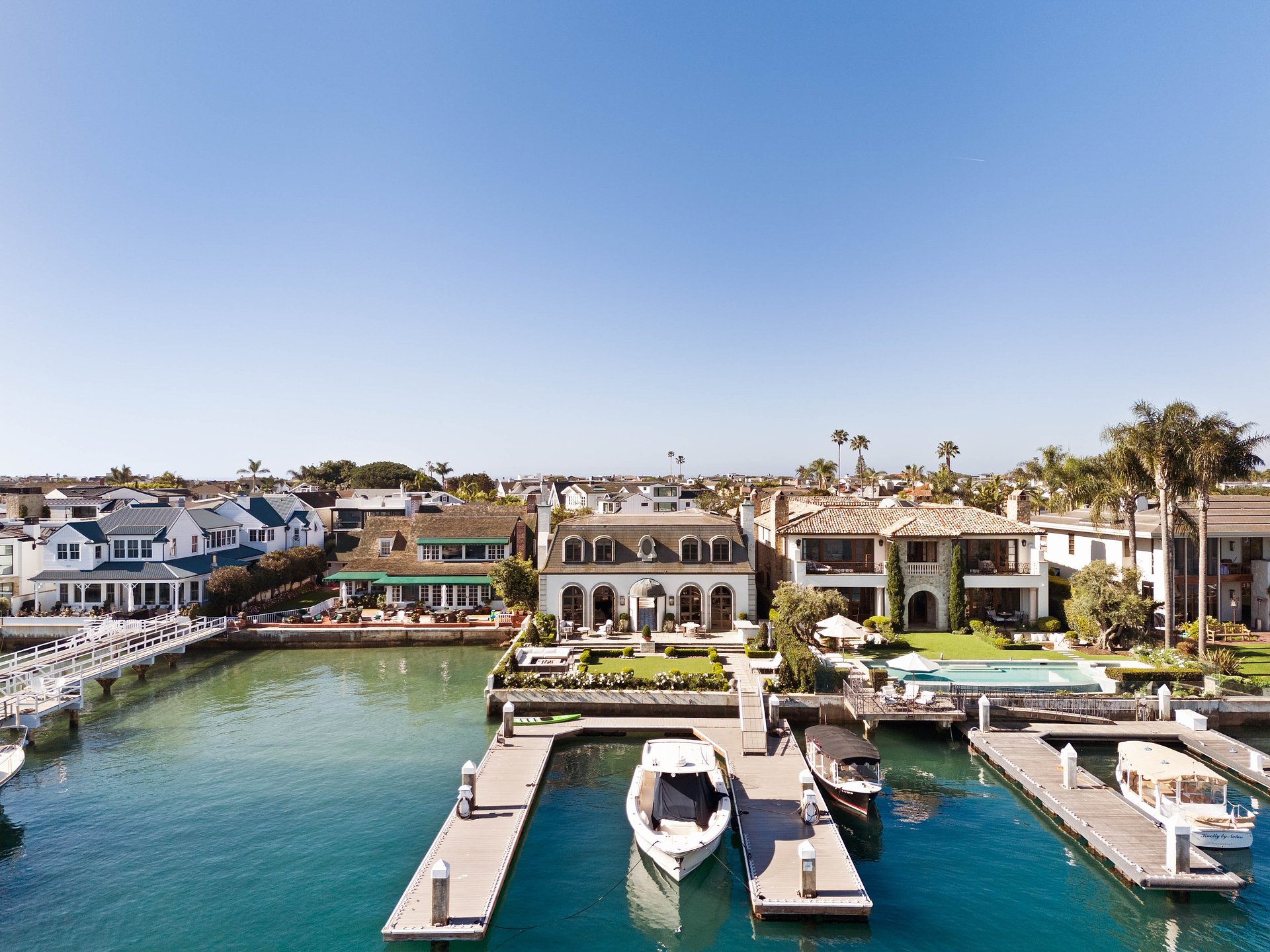French-Inspired Hollywood Regency Bayfront Estate with Premier Dock Capacity Listed for $29,500,000 by Coldwell Banker Realty